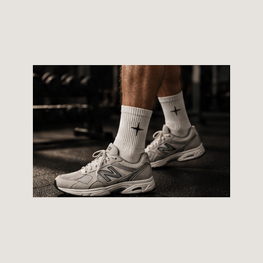 Crew Sock 01 in Vintage White, gym lifestyle photograph showing the socks worn with trainers. Design concept.